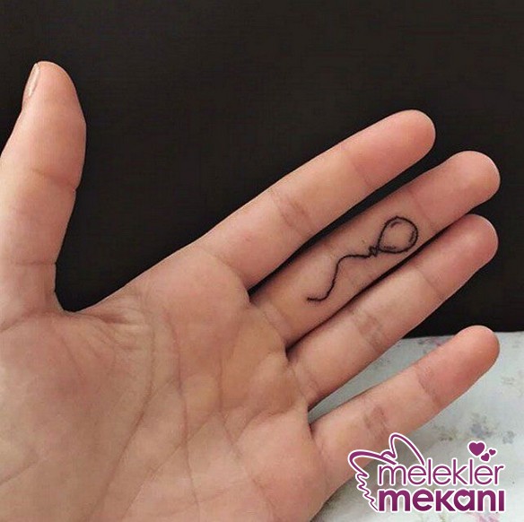 5d2f1e74b3821d803e6100f65f4ab661--tiny-finger-tattoos-finger-tattoo-designs.JPG