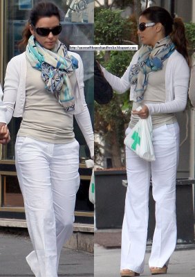 eva-longoria-white-cardigan-pants-blue-scarf-7002.jpg