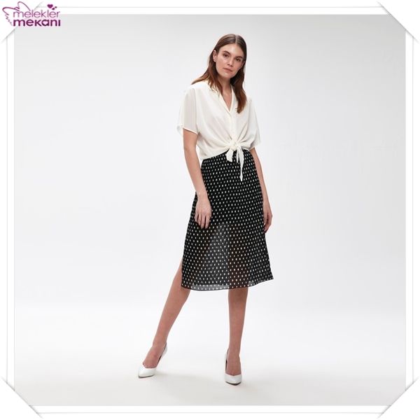 puantiyeli etek siyah modeli.jpg